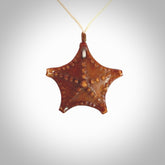 Hand carved bone starfish pendant. Ocean themed pendants carved by NZ Pacific. Moana pendants for sale online. Hand made stained bone sea star by Yuri Terenyi. We provide these starfish on adjustable cords. Postage is included in the price.